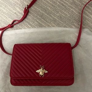 Never used red Crossbody bag